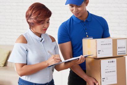 Woman signing document when receiving order