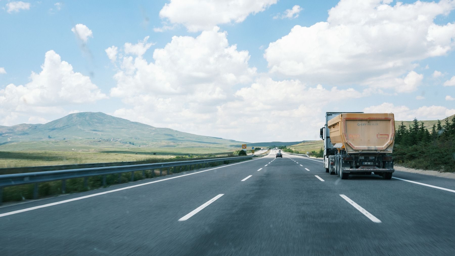 Freight truck on highway for road transport