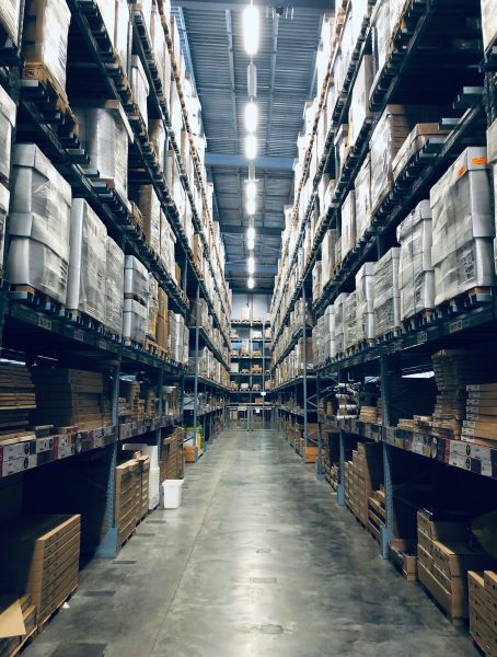 Warehouse aisle with palletized cartons ready for fulfillment freight